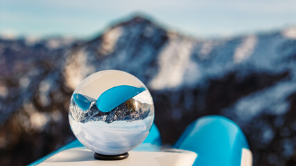 Crystal ball alpine winter landscape shot at Mount Predigtstuhl, Bad Reichenhall, Lattengebirge...