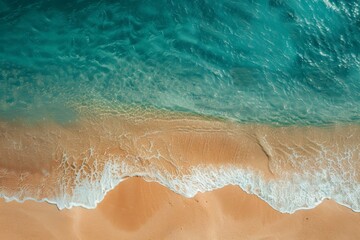 A serene beach scene with turquoise water and golden sand.