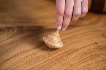 Handcrafted wooden spinning top toy