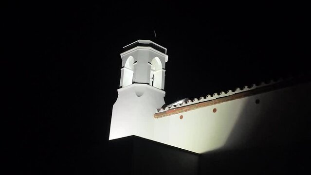 View to the white Spanish chapel at night, 4K