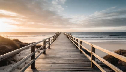 Zelfklevend Fotobehang Bosweg empty wooden walkway on the ocean coast in the sunset time pathway to beach