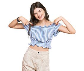 Young beautiful caucasian girl wearing casual clothes looking confident with smile on face,...