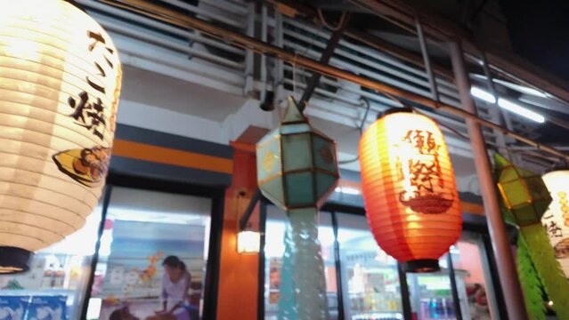 Chinese Paper Lanterns Alongside Shopfront