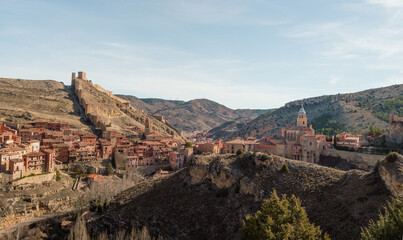 Albarracin in Teruel Spain, with red sandstone terracotta medieval houses, Moorish castle,...