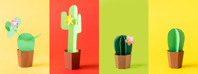 Cinco de Mayo concept - collage of four different paper cactus on solid color backgruond