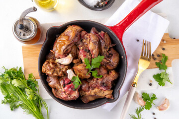 Fried chicken, turkey, duck, poultry liver, Baked diet meat food with herbs and spices, Poultry liver dinner background, copy space
