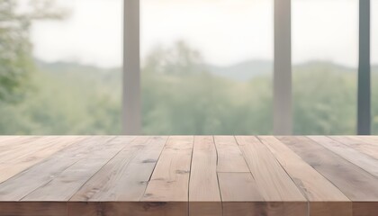 Empty wooden table with green trees background	