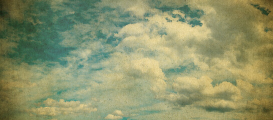 Blue cloudy sky background in vintage style..