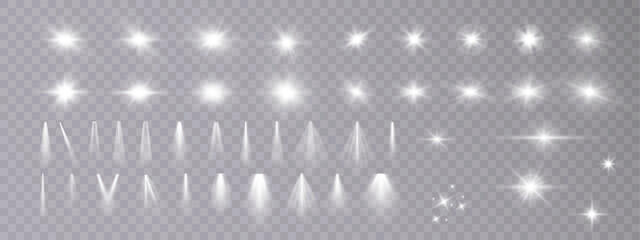 Set of white light spotlights, flashes of light on a transparent background. Vector glowing light effect.	