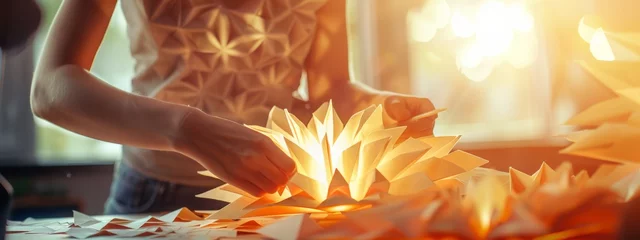 Fotobehang A close-up of a skilled paper artist creating intricate origami sculptures in a sunlit room realistic stock photography © JovialFox