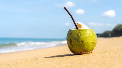 Coconut cocktail on the sandy beach