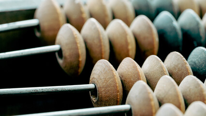 Vintage abacus or abacus on wooden background
