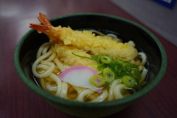 Japanese Udon noodles with shrimps tempura in a bowl