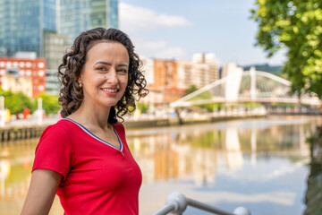 Radiant Smile by the Bilbao Riverside at Golden Hour