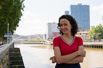 Radiant Smile by the Bilbao Riverside on a Sunny Day
