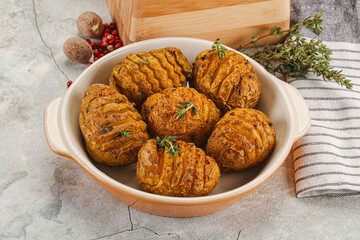 Baked baby potato with thyme