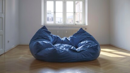 A bean bag chair sitting in front of a window on an empty floor, AI