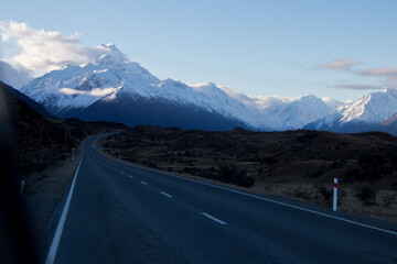 Road winding into the snowy mountains
