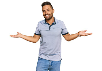 Handsome man with beard wearing casual clothes smiling showing both hands open palms, presenting...
