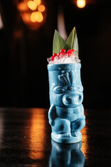 tropical asian cocktail decorated with bamboo leaves