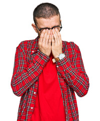 Hispanic young man wearing casual clothes rubbing eyes for fatigue and headache, sleepy and tired...