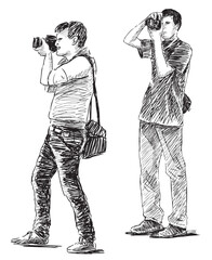 Photographers, two young men taking pictures on camera, profile, sketch, vector hand drawing black and white isolated on white - 774970142