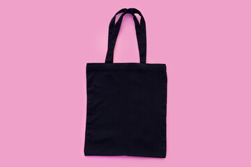 Black cotton, canvas, tote, mesh bag on light pink background. Zero waste, no plastic,eco friendly...