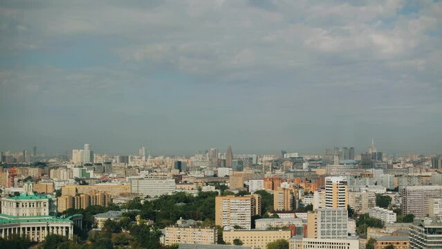 The panorama of the big city was taken from a tall building. The whole city is at a glance