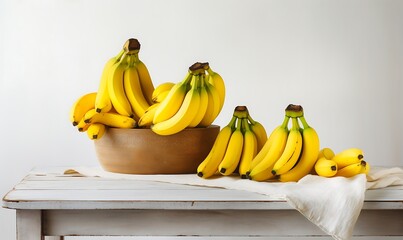 Bunch of bananas in wooden bowl on table