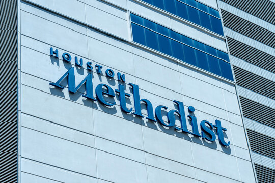 Houston, Texas, USA - April 3, 2024: Houston Methodist close up sign on the building in Houston, Texas, USA. Houston Methodist is an academic medical center.
