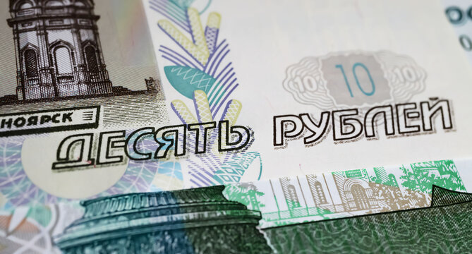 Closeup of russian ruble cash currency banknotes (focus on center)
