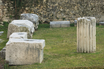Ruins of ancient Roman columns. Detail of the Roman forum in Brescia, Italy