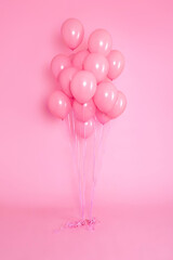 Set of Air Balloons. Bunch of pink color balloons isolated on pink background. Love. Holiday celebration. Valentine's Day party decoration.