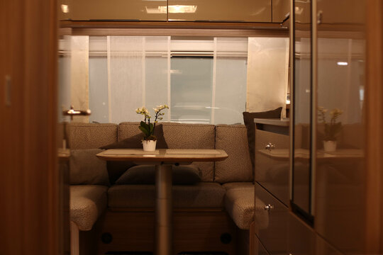 Interior design of a living room in a camper. Caravan, motorhome. Mobile home.
