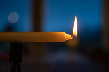 Closeup of a candle on a blurry background