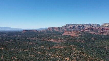 Aerial view of geological formations in Sedona desert town, Arizona, in daylight