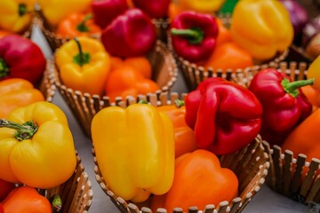 Closeup of red and yellow peppers