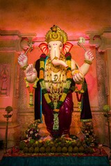 Vertical shot of the idol of Lord Ganesha