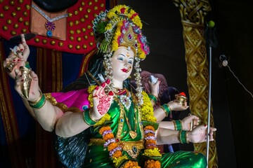 Fototapeta premium Idol of Maa Durga being worshipped at a Mandal in Mumbai, India, for Navratri