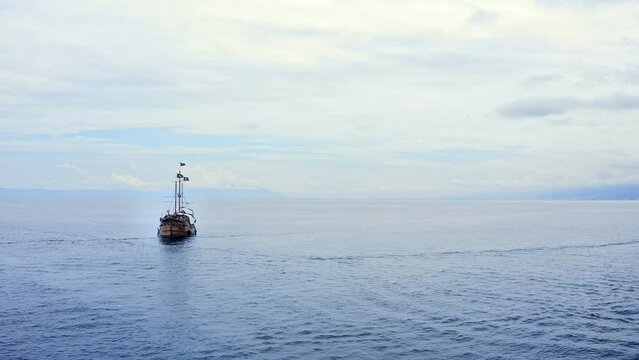 Drone footage of a pirate ship sailing in the ocean in Punta Mita, Mexico