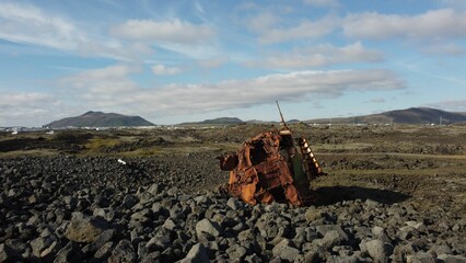 Old rusty shipwreck on the coastline of Grindavik in Iceland