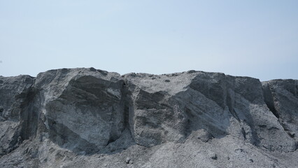 Fototapeta premium A gray volcanic mountain on a sunny day