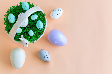 Porcelain basket with cress and Easter eggs on a pastel background