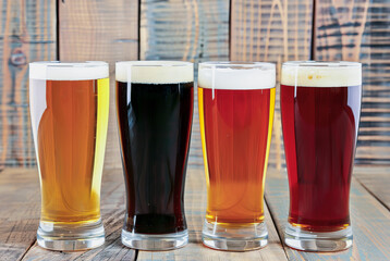 Variety of Craft Beers in Pint Glasses on Wooden Table