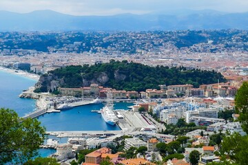 View of Split harbor, sea, and mountains from hilltop: The Port of Nice and Castle Hill, France
