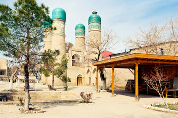 Ancient architecture of Uzbekistan - Madrasah Chor Minor in Bukhara  - obrazy, fototapety, plakaty