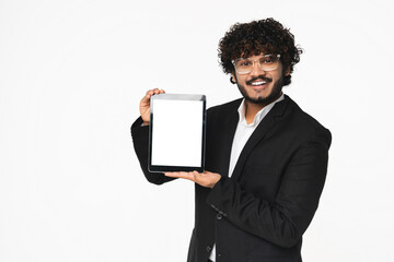 Indian young Hindu businessman showing screen of digital tablet isolated over white background.