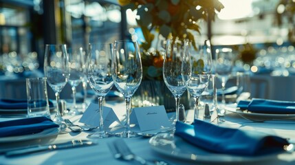 A close up of a table set with wine glasses