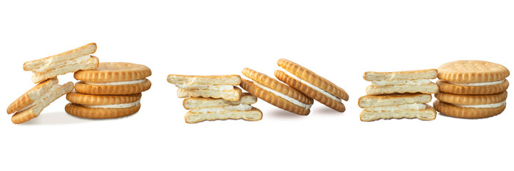 A set of cracker cookies with white cream arranged in a row on a white background.