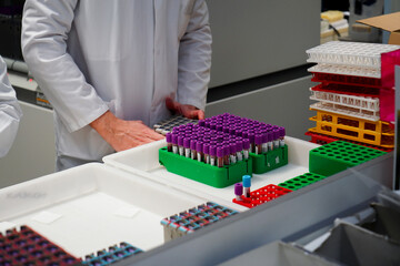 Technical platform of  laboratory . Sorting sample tubes from other laboratories before dispatch with the automated sorter.